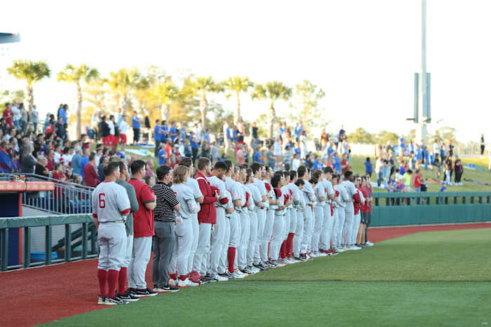 Alabama Baseball stands for the national anthem prior to its contest with the Florida Gators at Condron Family Ballpark in Gainesville, Fla.
